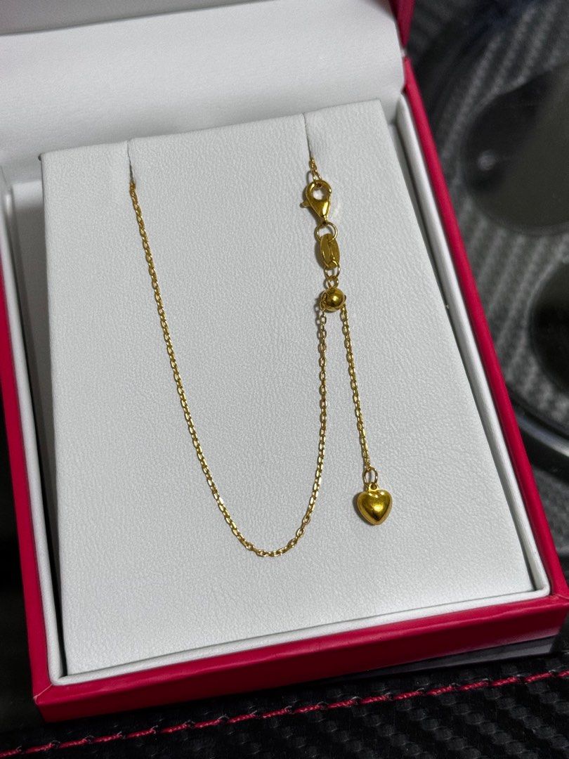 Adjustable length gold necklace top