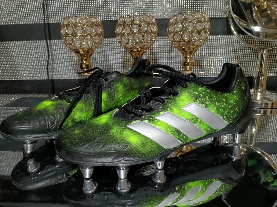 Black and store gold rugby boots