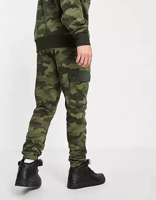 Champion camo sweatpants Men s Fashion Bottoms Joggers on Carousell