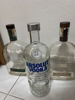 Empty bottles - 2x Woodford whisky, 1x Absolut vodka 1L