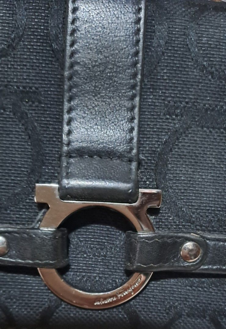 Ferragamo Bi-fold LONG wallet -Available (Category: Luxury Bags & Wallets) located in Baguio. Submitted by mng_assorted_baguio (Listing ID 1268447663, Image 3). Description: Vintage pre owned Salvatorre Ferragamo bi fold LONG wallet monogram canvass and leather material coded and made in italy clean interior pls expect signs of usage as the item is pre loved but still in pristine condition. open for shipping NoCOD/COP/ShppCheckout.