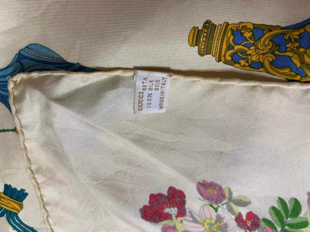 Gucci large scarf Silk square scarf (Category: Luxury Accessories) located in Teresa. Submitted by recherchediva (Listing ID 1268370169, Image 2). Description: 50% off for a limited time only!!! GUCCI Scarf 84cm 33″ floral and perfume bottles design AUTHENTIC 💯 100% pure silk rolled hem 💡This would be nice worn but is a great work of art you can hang on a frame. We can customize a wooden frame or other materials for plastic or metal with an ext