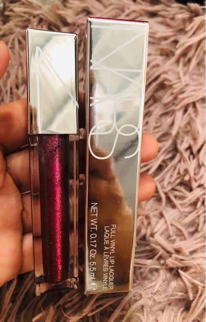 Nars Abruzzo Full Vinyl Lip Lacquer (Category: Makeup) located in Makati City. Submitted by blissfulfindsph (Listing ID 1268349686, Image 2). Description: 💯 authentic Imported from 🇺🇸 PATENT SHINE. HIGH-OCTANE COLOR. Go to extremes with new Full Vinyl Lip Lacquer. Lips take a dip in mirror-like shine. Creamy formula drenches with intense color. Vitamin E imparts a moisturizing feel. A unique, two-sided applicator makes for an amplified shine f