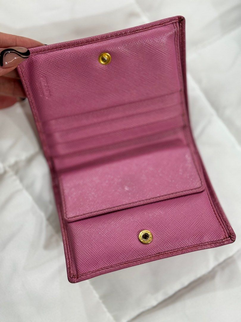 Prada Wallet (Category: Luxury Bags & Wallets) located in Quezon City. Submitted by irispx (Listing ID 1268500175, Image 3). Description: Authentic Prada Wallet With Box & Card Well Used.