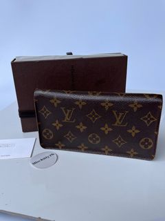 Preowned authentic Louis Vuitton LV long zip wallet