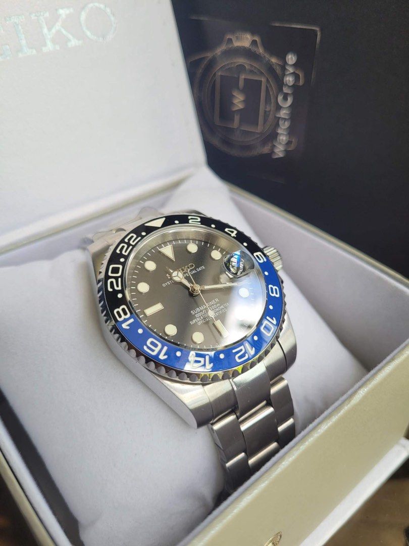 Seiko Batman GMT Master (Category: Luxury Watches) located in Makati City. Submitted by bradd09 (Listing ID 1268430711, Image 2). Description: Hello selling my Seiko Batman mod Brand new Condition Automatic Seiko movement Qc Area pickup or via shipping Message me for inquiries Limited stocks only. Price will be updated next week .