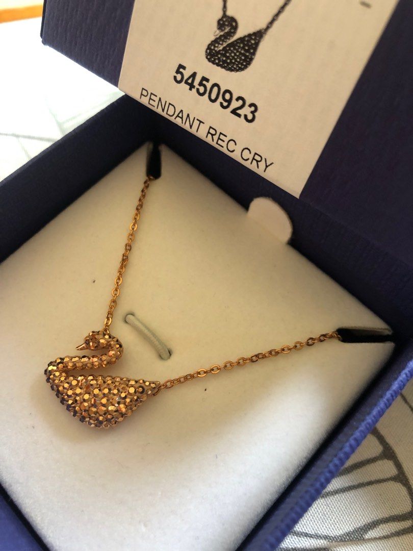 Swarovski Iconic Swan Necklace (Category: Necklaces) located in Talisay. Submitted by lesflo1819 (Listing ID 1268346390, Image 2). Description: Swarovski Iconic Swan Necklace Guaranteed authentic bought in Switzerland Rosegold Comes with extra chain for extended length Comes with gift box and shop bag .