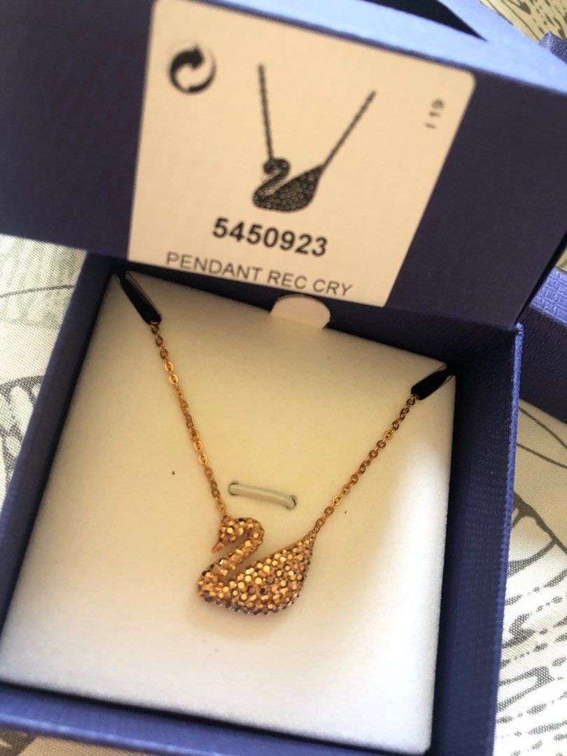 Swarovski Iconic Swan Necklace (Category: Necklaces) located in Talisay. Submitted by lesflo1819 (Listing ID 1268346390, Image 1). Description: Swarovski Iconic Swan Necklace Guaranteed authentic bought in Switzerland Rosegold Comes with extra chain for extended length Comes with gift box and shop bag .