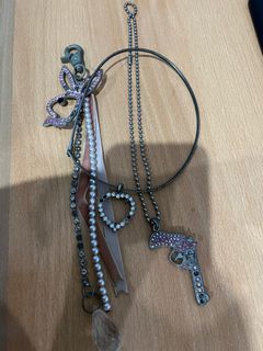 Take all 2 necklaces and bag chain