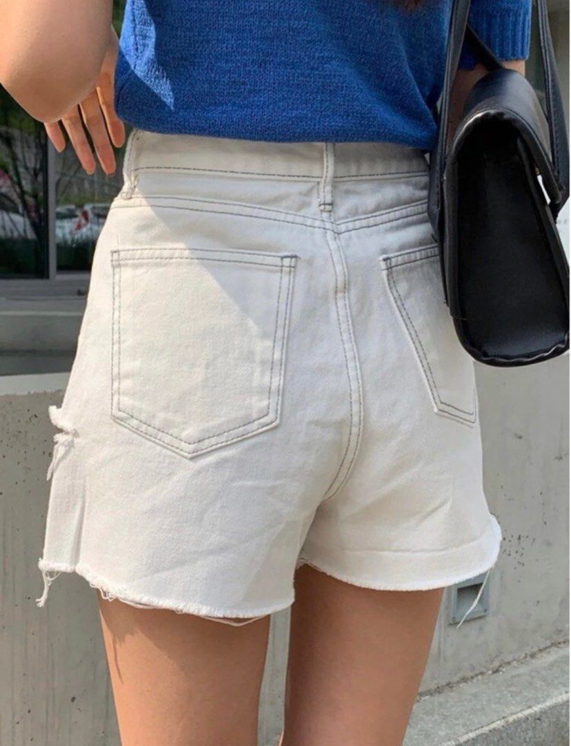 White ripped shorts online