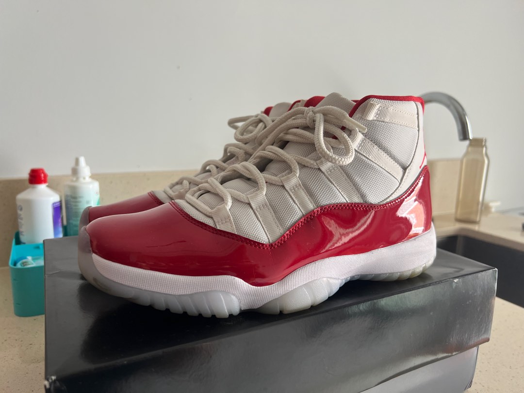 Red jordan 11 best sale low top