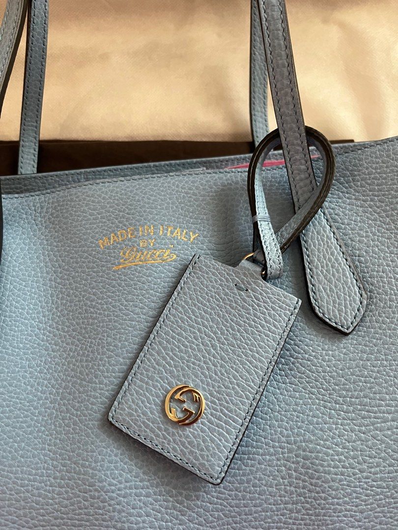 Authentic Gucci Swing (Category: Luxury Bags & Wallets) located in Makati City. Submitted by mintbags (Listing ID 1263592717, Image 2). Description: Authentic Gucci Swing Tote bag Powder blue Large Like new Used few times for travel Mint condition Check photos With dustbag and card.