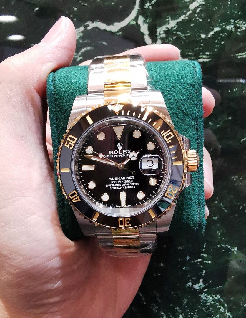 Gold submariner 2024 black dial