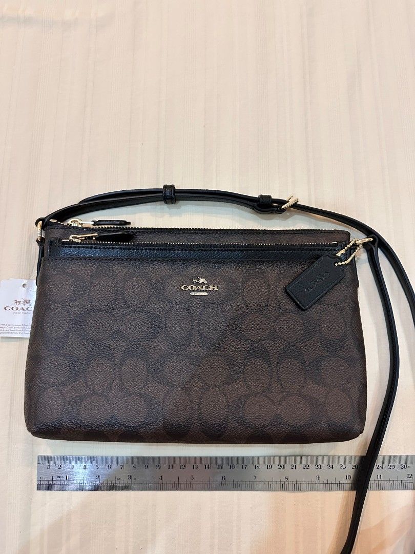 Coach east west crossbody with pop up pouch store