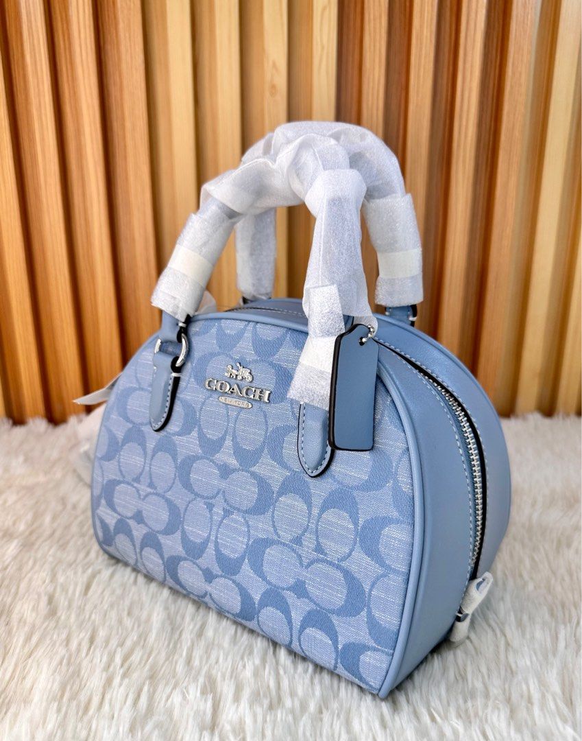 Coach Sydney Crossbody (Category: Luxury Bags & Wallets) located in Mandaluyong City. Submitted by shop_0n_the_spot (Listing ID 1263660464, Image 2). Description: 💯% GUARANTEED ORIGINAL & BRAND NEW. ✅ Brand New with Tag, Carecard ✅ Polyplastic ✅ Paper bag (if only available) ▪️We shall not be held responsible/liable for any lost/damage/delay due to courier negligence. ▪️All joy miners will no longer be entertained in the future. ▪️If in DOUBT do