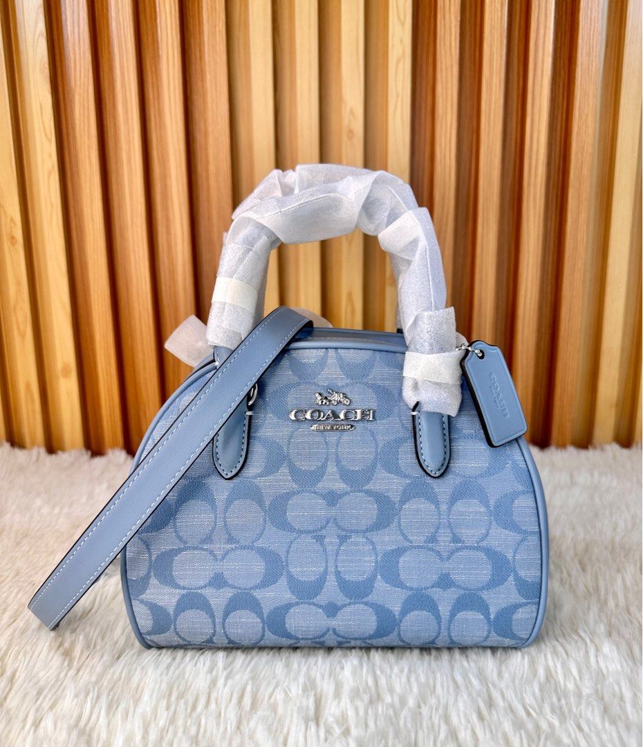 Coach Sydney Crossbody (Category: Luxury Bags & Wallets) located in Mandaluyong City. Submitted by shop_0n_the_spot (Listing ID 1263660464, Image 3). Description: 💯% GUARANTEED ORIGINAL & BRAND NEW. ✅ Brand New with Tag, Carecard ✅ Polyplastic ✅ Paper bag (if only available) ▪️We shall not be held responsible/liable for any lost/damage/delay due to courier negligence. ▪️All joy miners will no longer be entertained in the future. ▪️If in DOUBT do