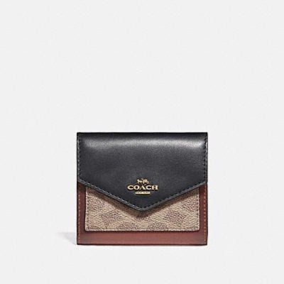Black and pink coach wallet clearance