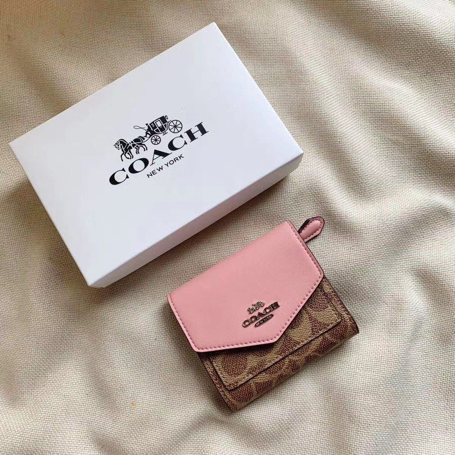 Small pink coach wallet sales