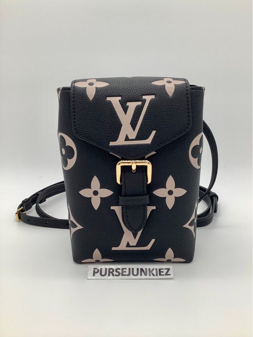 Louis Vuitton Tiny Backpack. Bicolour monogram empreinte, gradated canvas.  