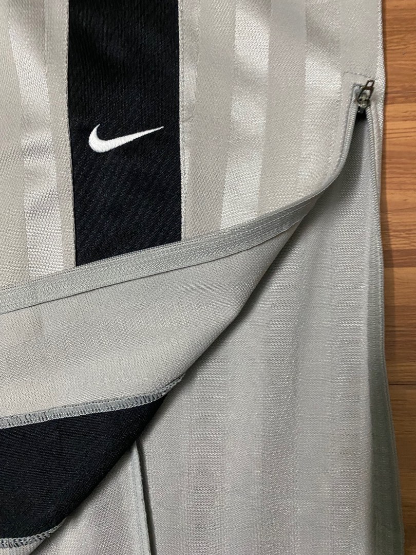 Nike track pants on sale stripe