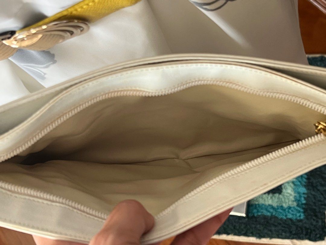 Salvatore Ferragamo Sling bag (Category: Luxury Bags & Wallets) located in Manila. Submitted by luxeclassyshop (Listing ID 1263591720, Image 3). Description: Original from italy There is code to proof original White color No paper bag No dustbag No box Only bag Leather Sling bag The size is posted The flaws is posted .