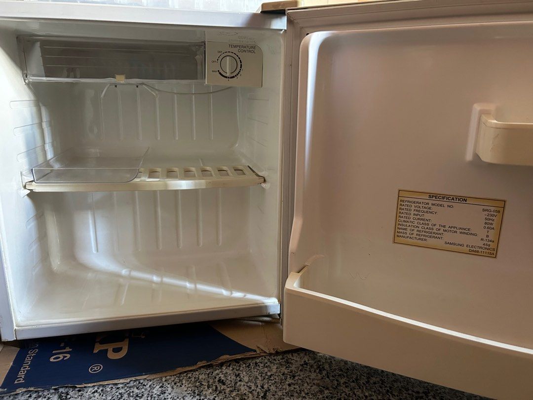 Samsung compact refrigerator well use but still in working condition, TV & Home Appliances