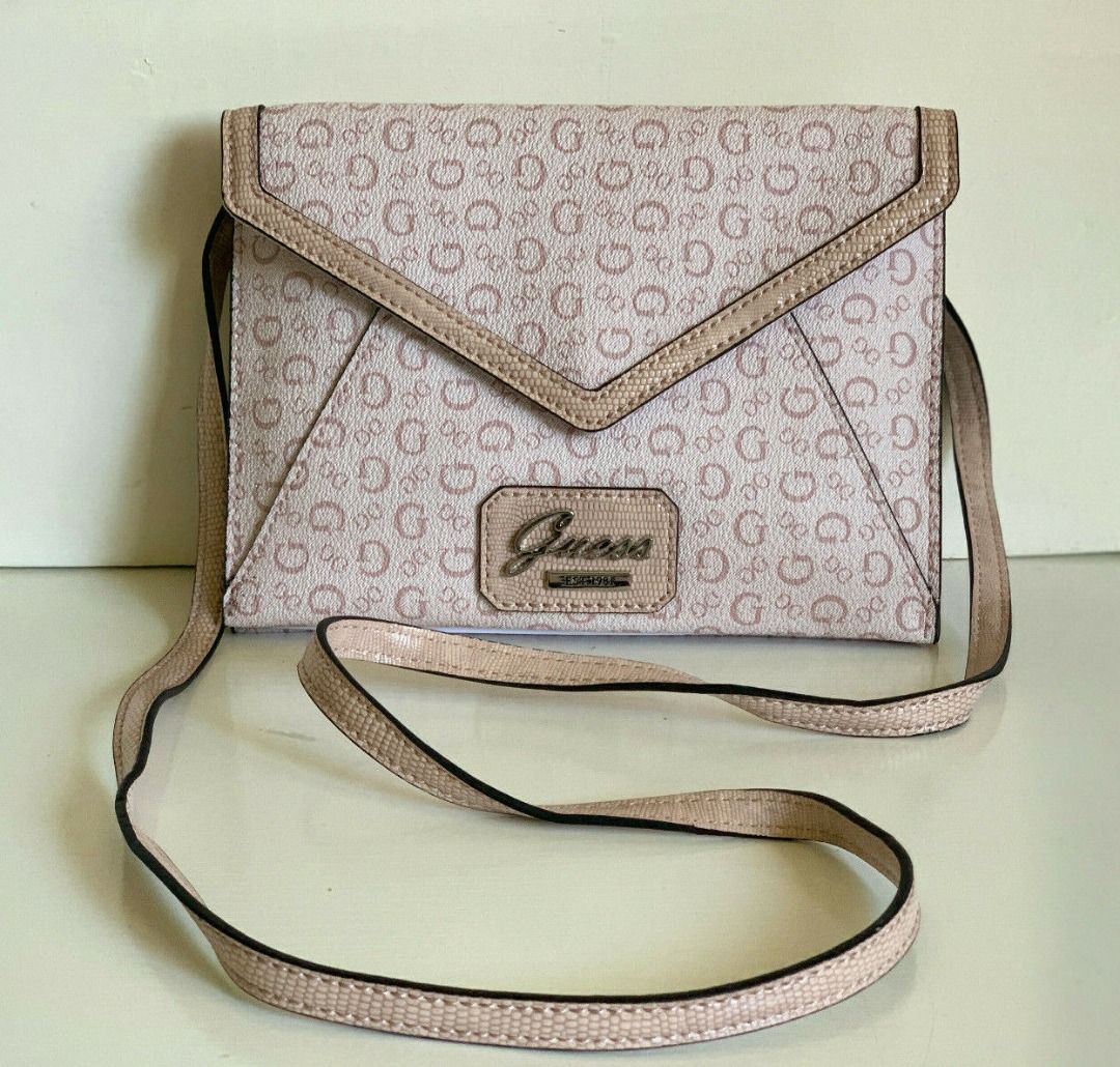 Guess sling bag sale 2025