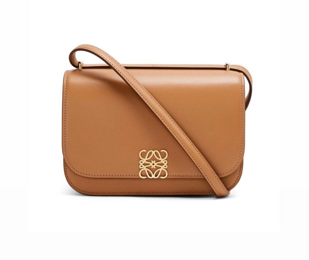 Loewe Goya Bag (Category: Luxury Bags & Wallets) located in Quezon City. Submitted by preloved__thingz (Listing ID 1268671156, Image 1). Description: Authentic! Loewe Small Goya Bag in Camel and Black Always out of stock! Comes complete.