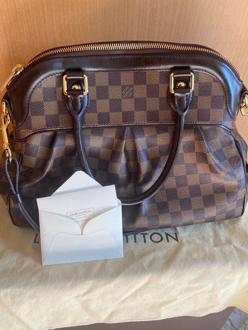 LOUIS VUITTON Trevi Damier (Category: Luxury Bags & Wallets) located in Makati City. Submitted by ycaa. (Listing ID 1268656188, Image 2). Description: LV Trevi Damier 2way Hand Shoulder Bag Good as New W/ Complete Inclusions Box / Dustbag & Authentication cards.