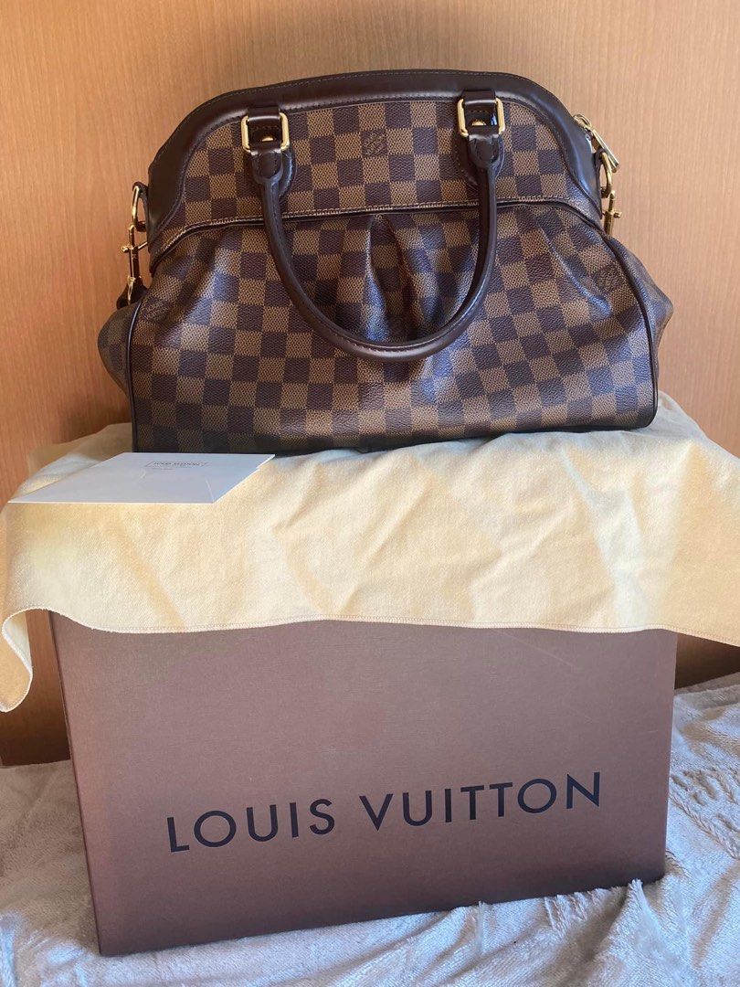 LOUIS VUITTON Trevi Damier (Category: Luxury Bags & Wallets) located in Makati City. Submitted by ycaa. (Listing ID 1268656188, Image 1). Description: LV Trevi Damier 2way Hand Shoulder Bag Good as New W/ Complete Inclusions Box / Dustbag & Authentication cards.