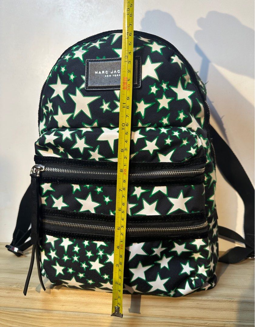 Marc Jacobs Flocked Stars Mini Backpack (Category: Luxury Bags & Wallets) located in Pasig City. Submitted by armoire_deluxe (Listing ID 1268641080, Image 3). Description: Pre💕 item. In good condition..