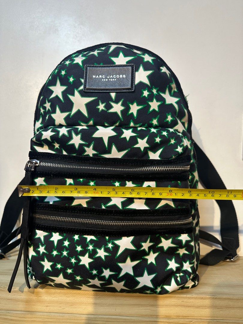 Marc Jacobs Flocked Stars Mini Backpack (Category: Luxury Bags & Wallets) located in Pasig City. Submitted by armoire_deluxe (Listing ID 1268641080, Image 2). Description: Pre💕 item. In good condition..