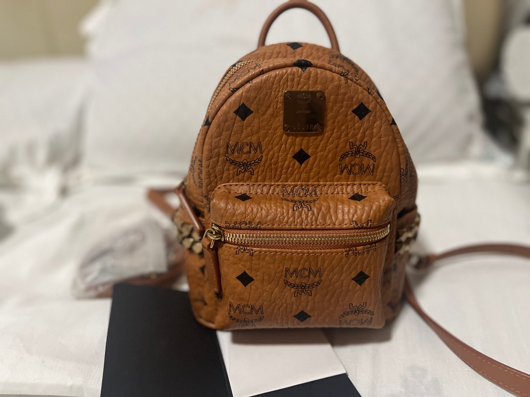 MCM mini backpack, Luxury, Bags & Wallets on Carousell