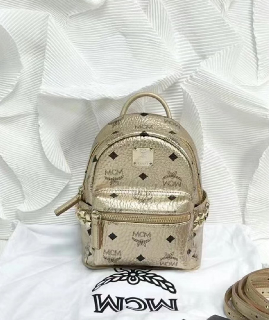 White and best sale gold mcm backpack