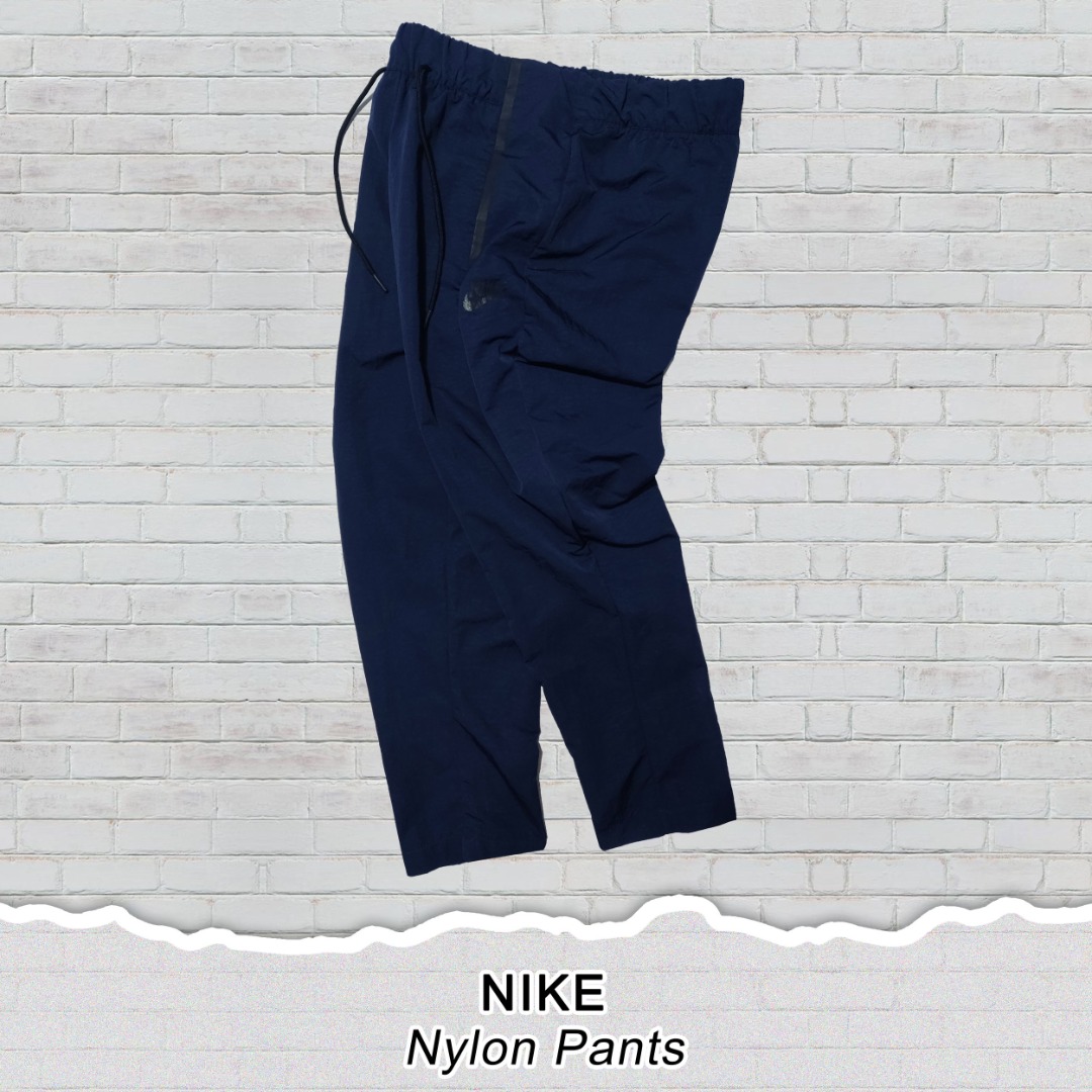 NIKE - Nylon Pants, Men's Fashion, Bottoms, Jeans on Carousell