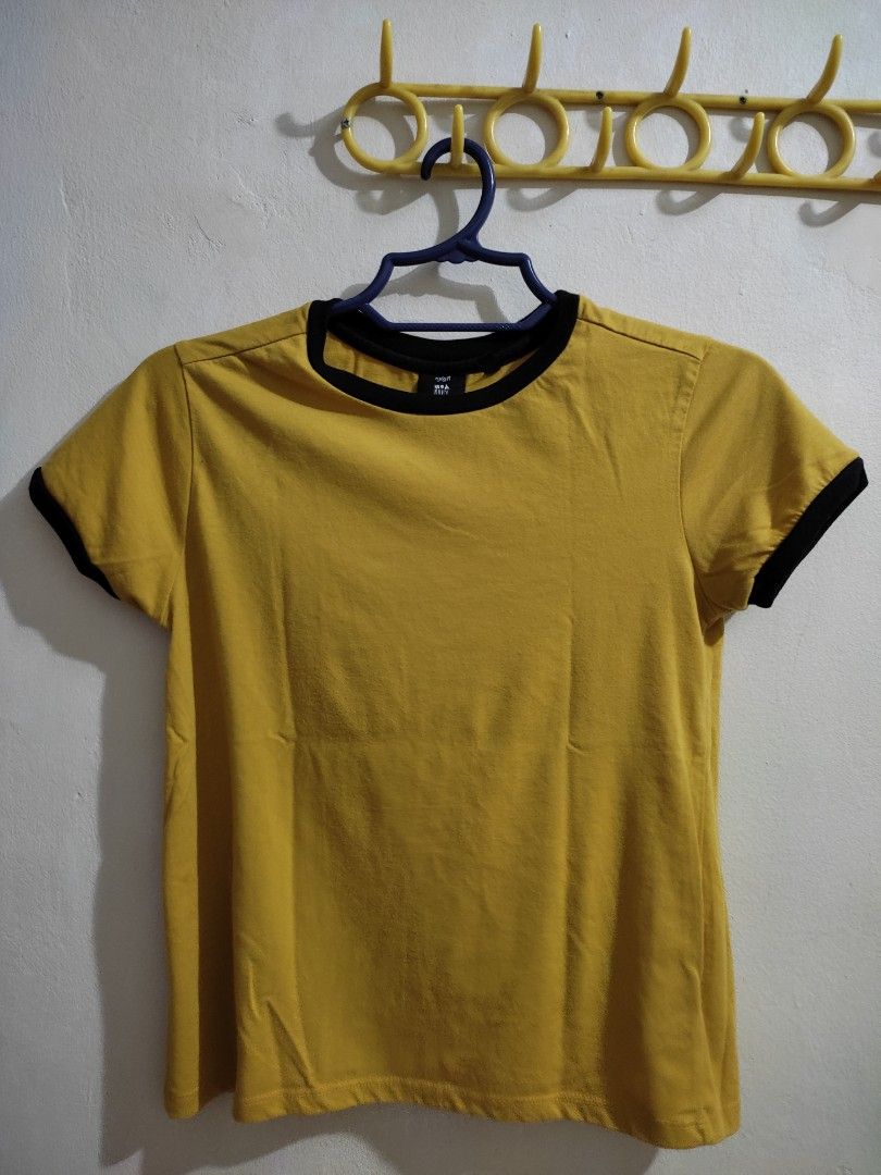 OXGN Black and Yellow Basic Tee for women (Category: Shirts) located in Las Pinas. Submitted by janelbejado (Listing ID 1268582661, Image 1). Description: very comfy. cotton. can send pictures when worn.