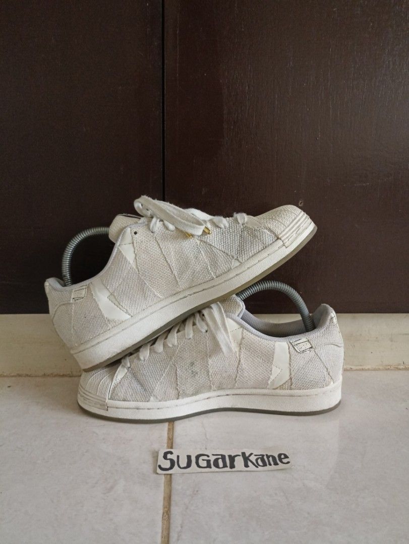 Adidas sneakers on top mummy