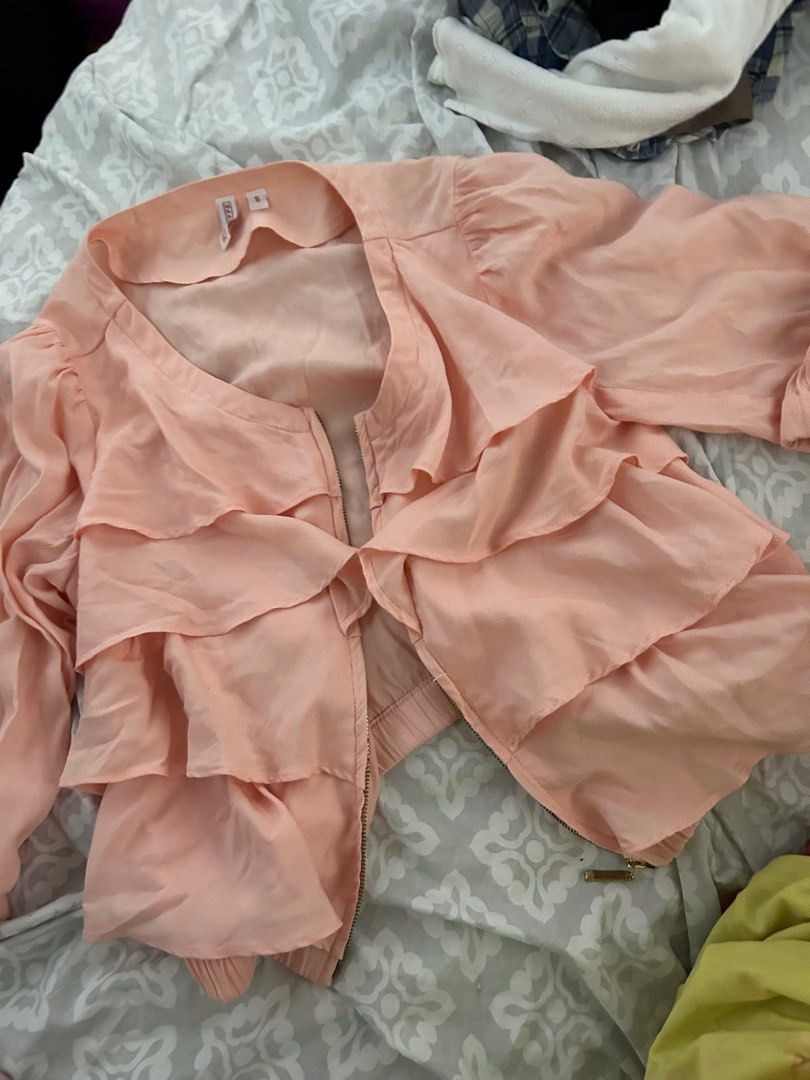 ruffle pink zipper jacket (Category: Activewear) located in Davao. Submitted by declutterstuff01 (Listing ID 1268669225, Image 1). Description: lightweight and cute!.
