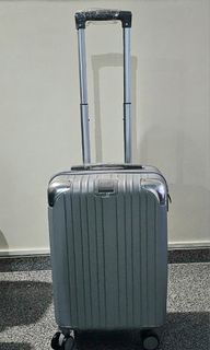 Supreme sticker 20 inch silver cabin size luggage