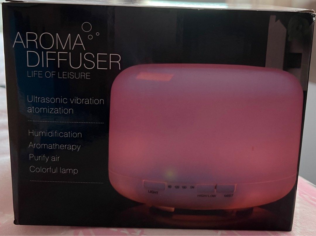 Aroma Diffuser (Category: Home Fragrance) located in Singapore. Submitted by kitty07 (Listing ID 1263804403, Image 2). Description: 1 Brand New in box @ $20 2 lightly used Aroma Diffuser $10 each.