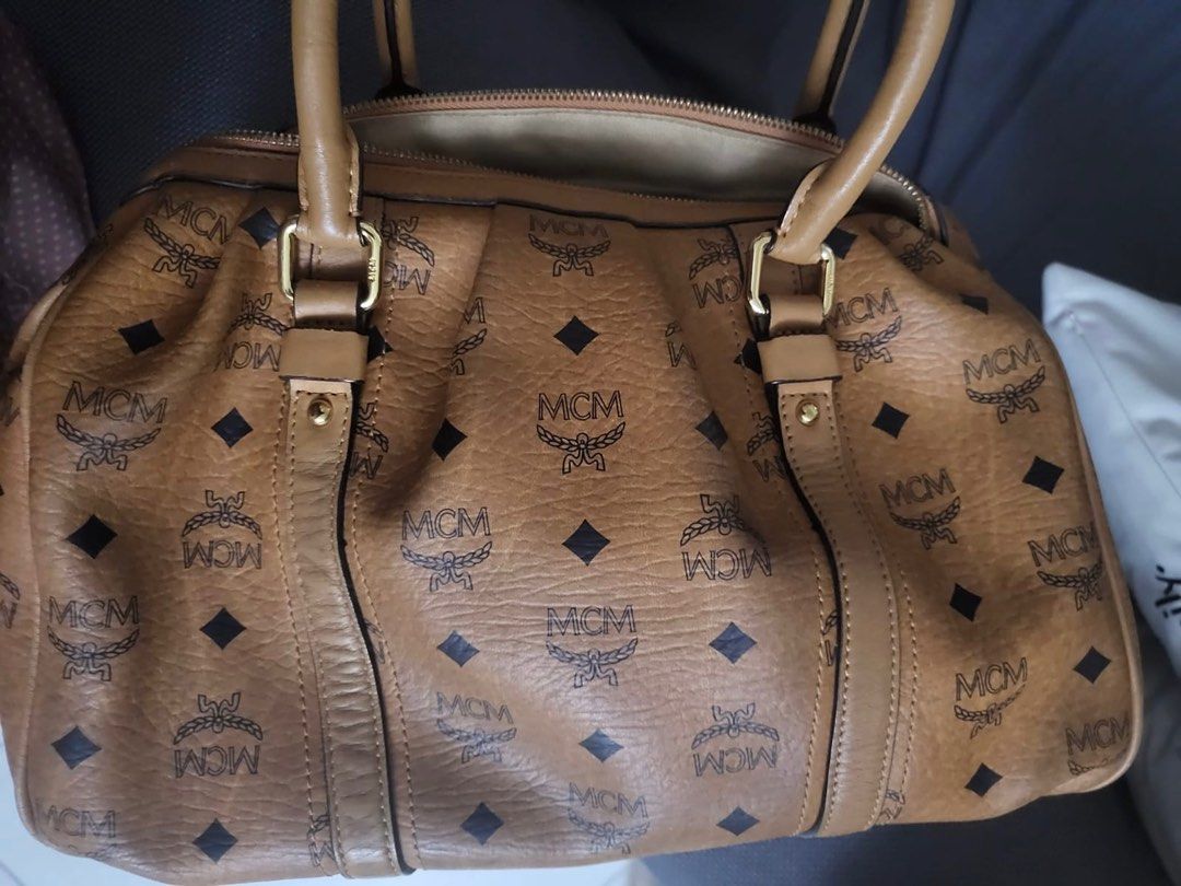 AUTHENTIC MCM VISETOS HANDBAG COGNAC LOGOPRINT MEDIUM (open for layaway) (Category: Luxury Bags & Wallets) located in Rizal. Submitted by SummerPeaCloset (Listing ID 1263838128, Image 3). Description: AUTHENTIC MCM VISETOS HANDBAG COGNAC LOGOPRINT MEDIUM (open for layaway) With lock and key .