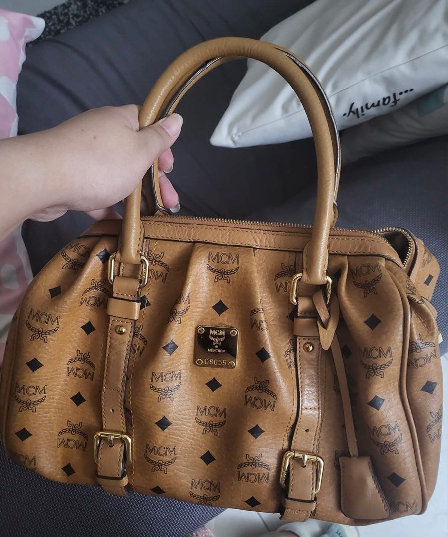 AUTHENTIC MCM VISETOS HANDBAG COGNAC LOGOPRINT MEDIUM (open for layaway) (Category: Luxury Bags & Wallets) located in Rizal. Submitted by SummerPeaCloset (Listing ID 1263838128, Image 2). Description: AUTHENTIC MCM VISETOS HANDBAG COGNAC LOGOPRINT MEDIUM (open for layaway) With lock and key .