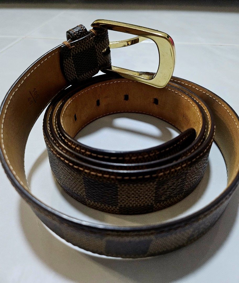 Brown and gold Lv belt, worn once has a extra hole