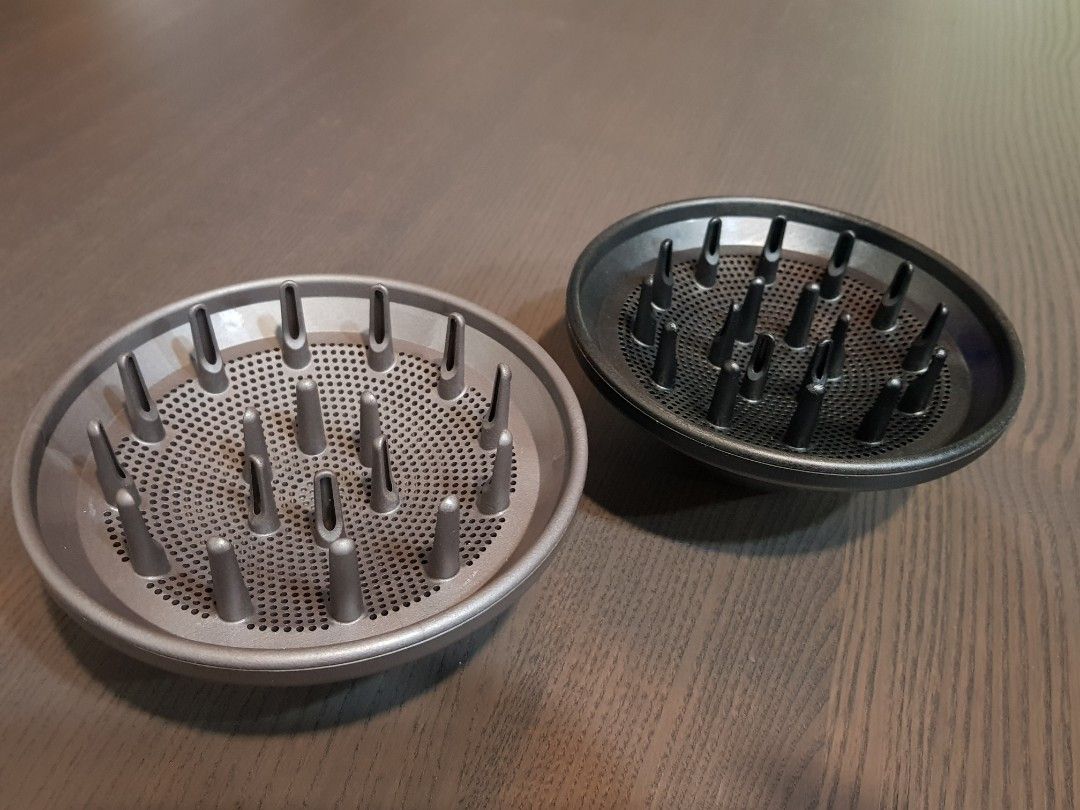 Dyson diffuser (Category: Hair) located in Singapore. Submitted by k810719 (Listing ID 1263711493, Image 2). Description: *new condition *40 each, 70 both *no negotiation.