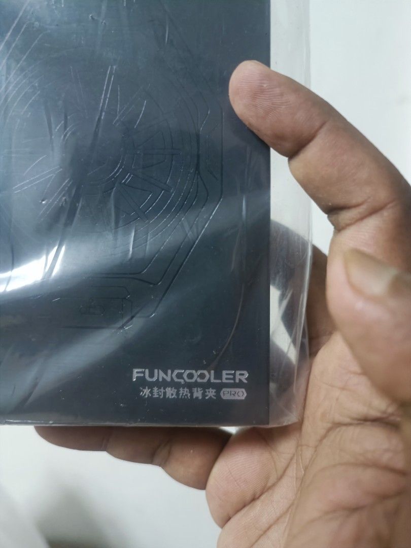 Funcooler Pro (Category: Other Mobile & Gadget Accessories) located in Singapore. Submitted by reasonable_seller (Listing ID 1263820805, Image 2). Description: black Shark fun cooler Pro. For gamers only. To cool down your CPU. Bought for a gaming competition. Total 10 sets available. tags game console game cooler phone cooler..