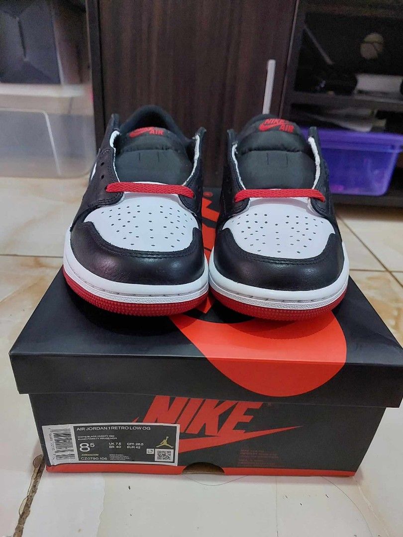 j1 low black toe price