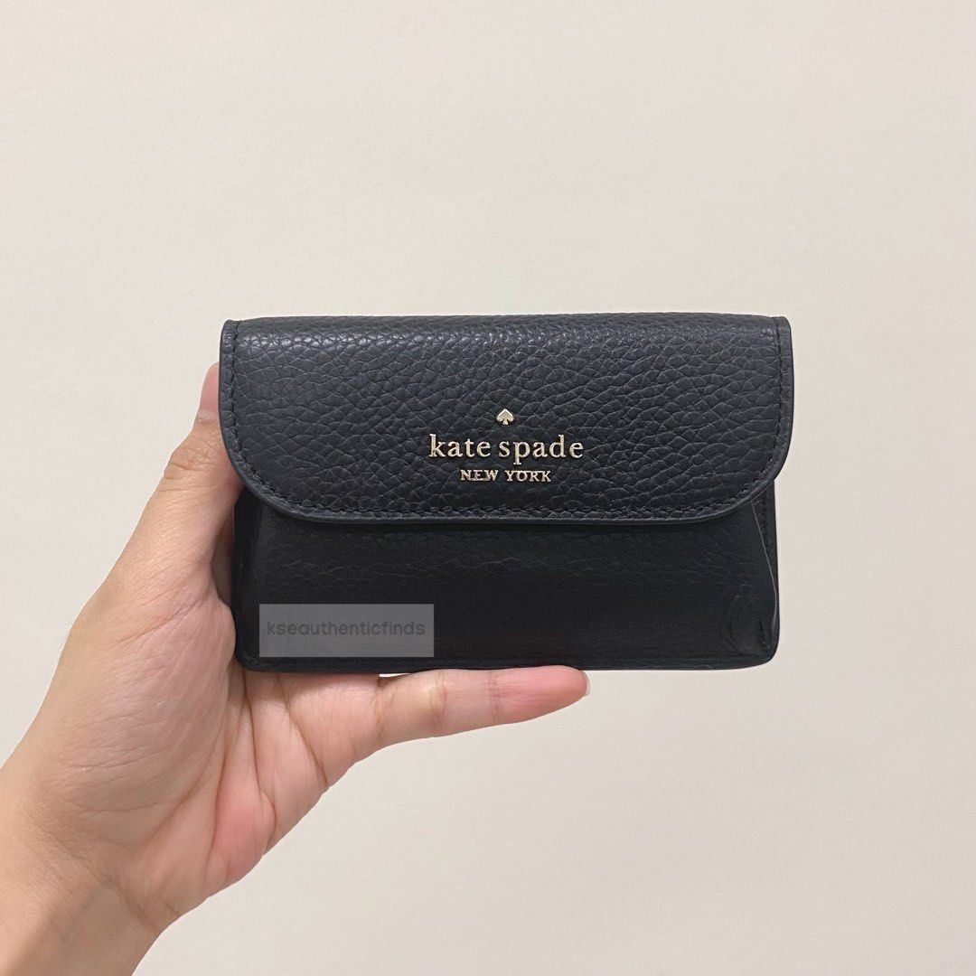 KATE SPADE Dumpling Flap Card Holder in Black (Category: Luxury Bags & Wallets) located in Pasig City. Submitted by kseauthenticfinds (Listing ID 1263751441, Image 1). Description: KATE SPADE Dumpling Small Flap Card Holder 🇺🇸🇨🇦 Inclusion: tag only Pasig on hand Product Details 3.28”h x 5”w pebbled leather 100% leather metal pinmount with spade 2 way spade jacquard lining zip pocket on back ​snap closure​.