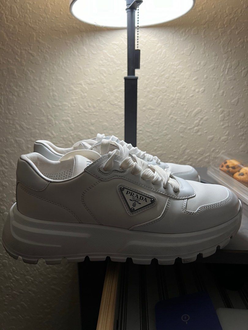 Prada white sneakers (Category: Sneakers) located in Manila. Submitted by mvplovedstuff (Listing ID 1263708848, Image 2). Description: Got this for 71k. bought it last September in Europe. This needs to be cleaned. Fits 7.5/8.