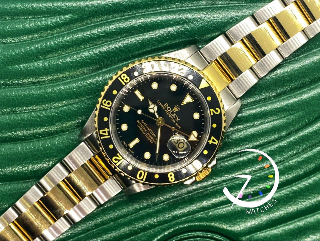 Rolex GMT Master 16713 two tone black dial
