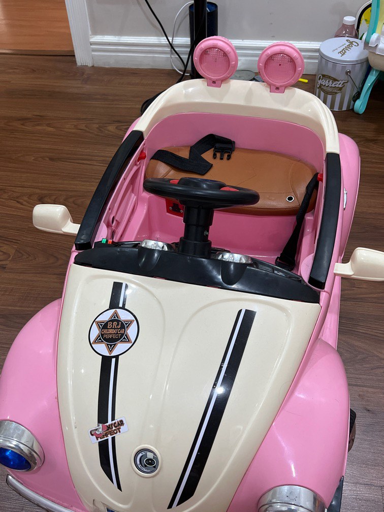 Volkswagon Pink with Charger electric car with charger, Babies & Kids, Infant Playtime on Carousell